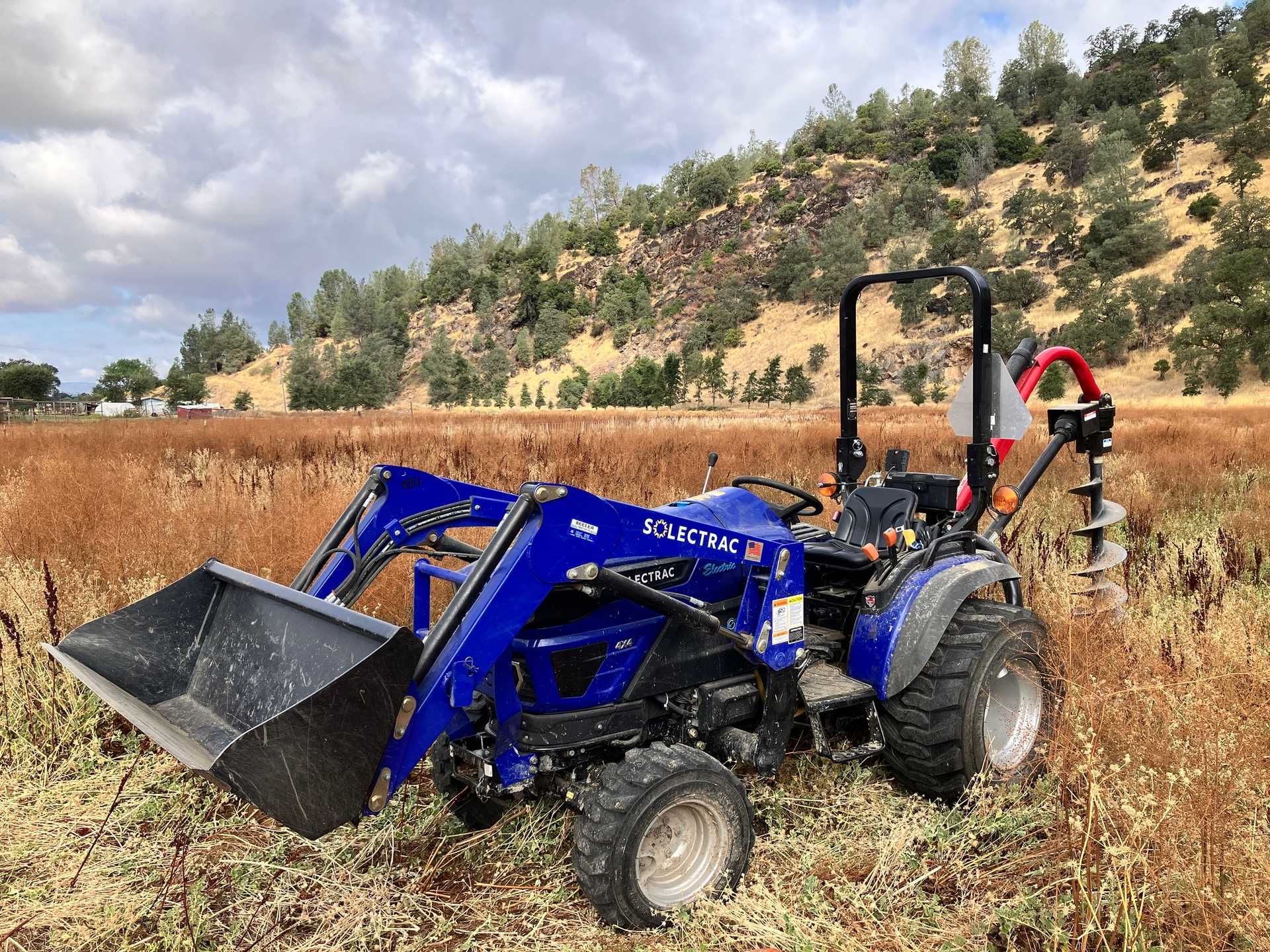 Electric tractor in the field